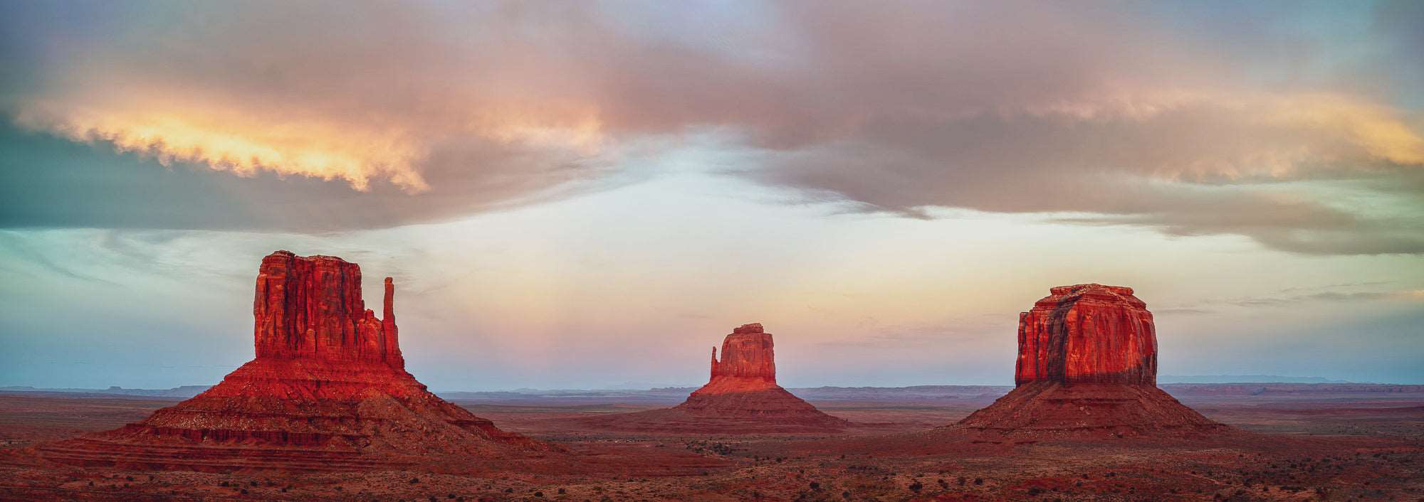 Majestic Guardians: Monument Valley Sunset Spectacle - Stephen Milner
