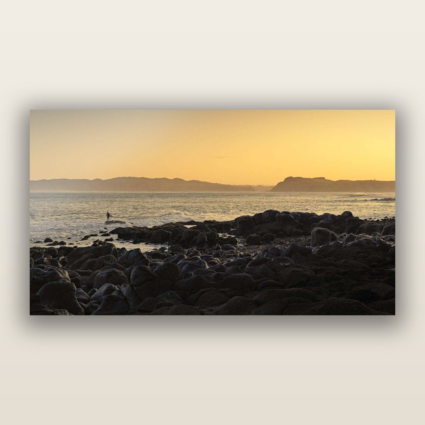Surfing the Sunrise, Raglan — frameless acrylic glass print. New Zealand fine art landscape photography by Stephen Milner.