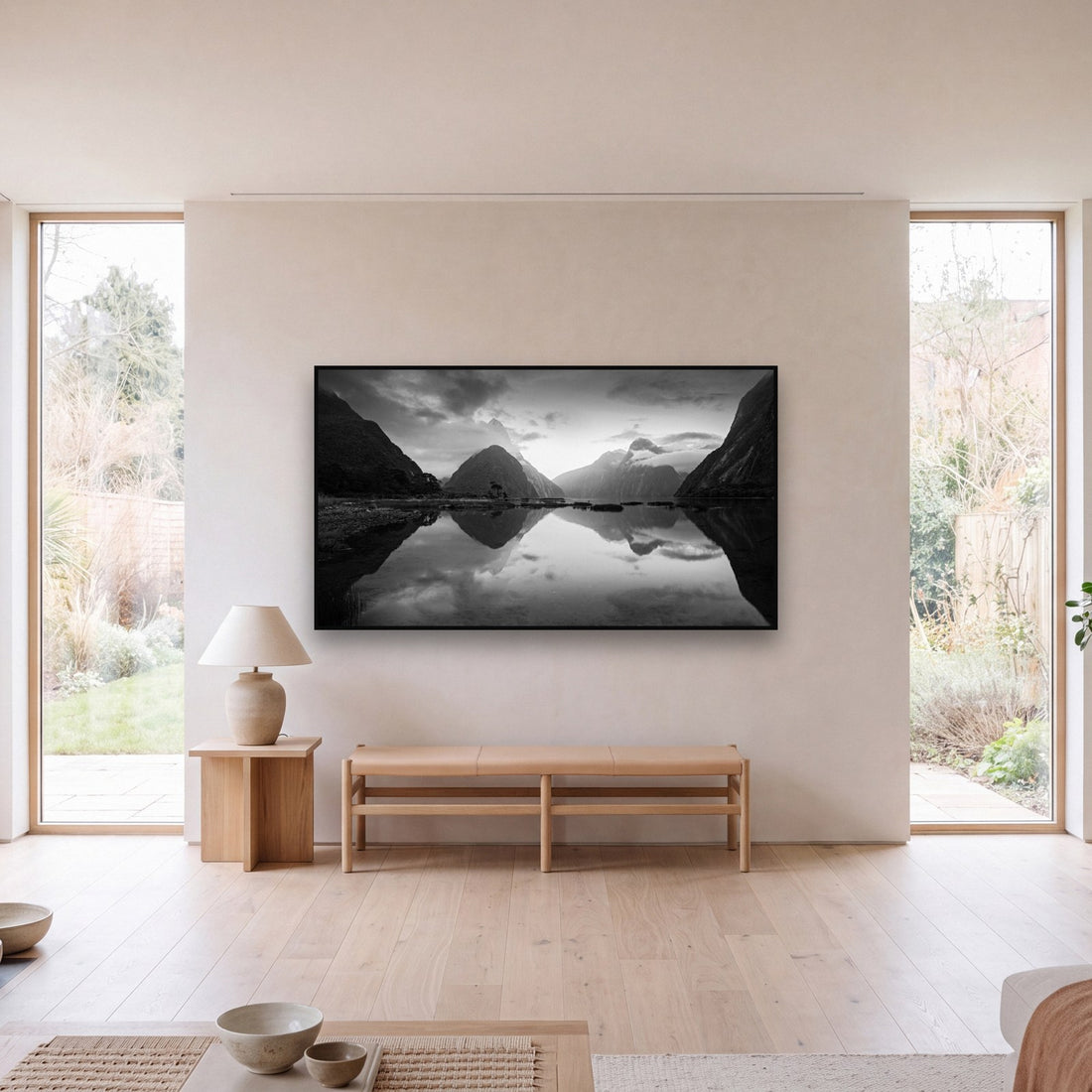 Large black and white fine art print of Mitre Peak, Milford Sound by Stephen Milner, shown in a styled interior
