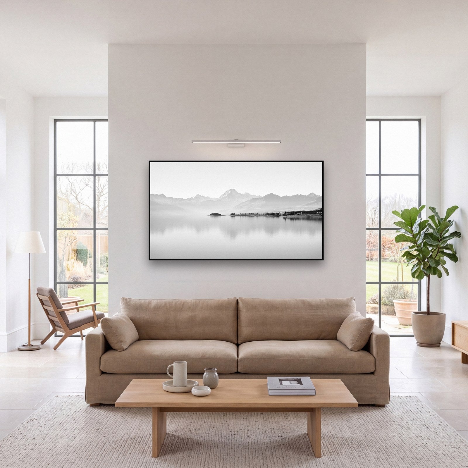 Large black and white fine art print of Aoraki Mount Cook by Stephen Milner, shown in a styled interior
