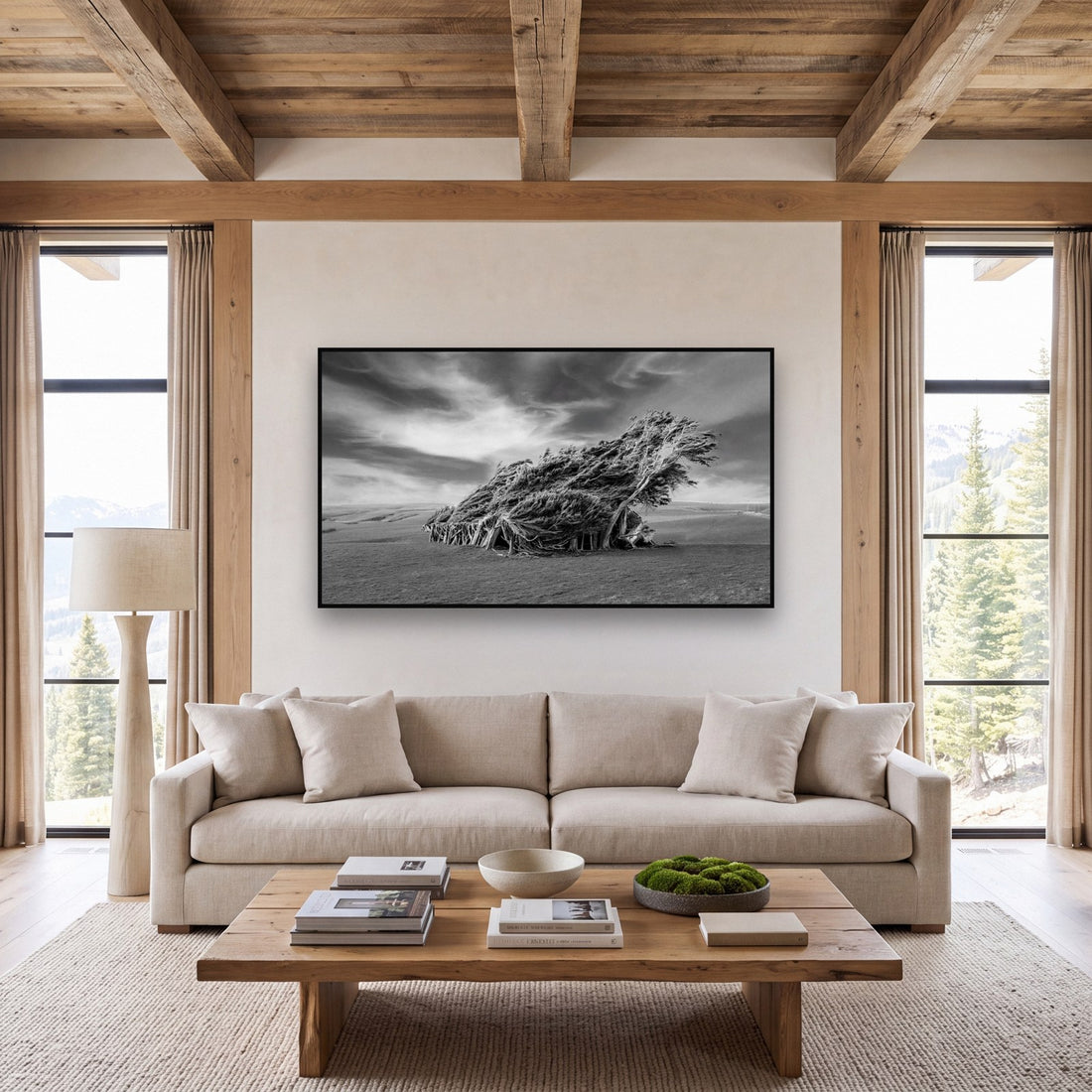 Large black and white fine art print of windswept dunes by Stephen Milner, shown in a styled interior