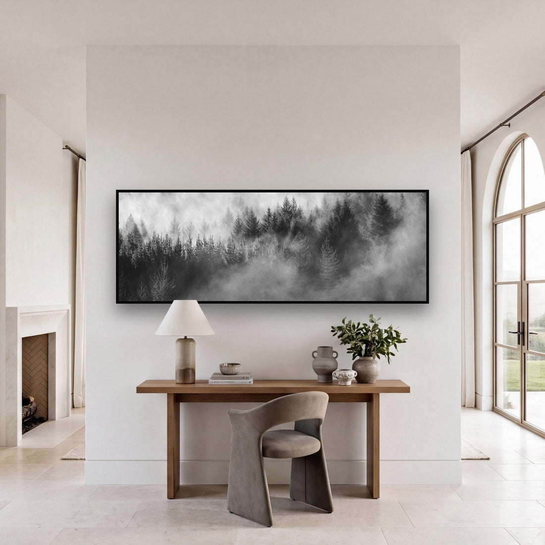 Large black and white fine art print of a redwood forest by Stephen Milner, shown in a styled interior