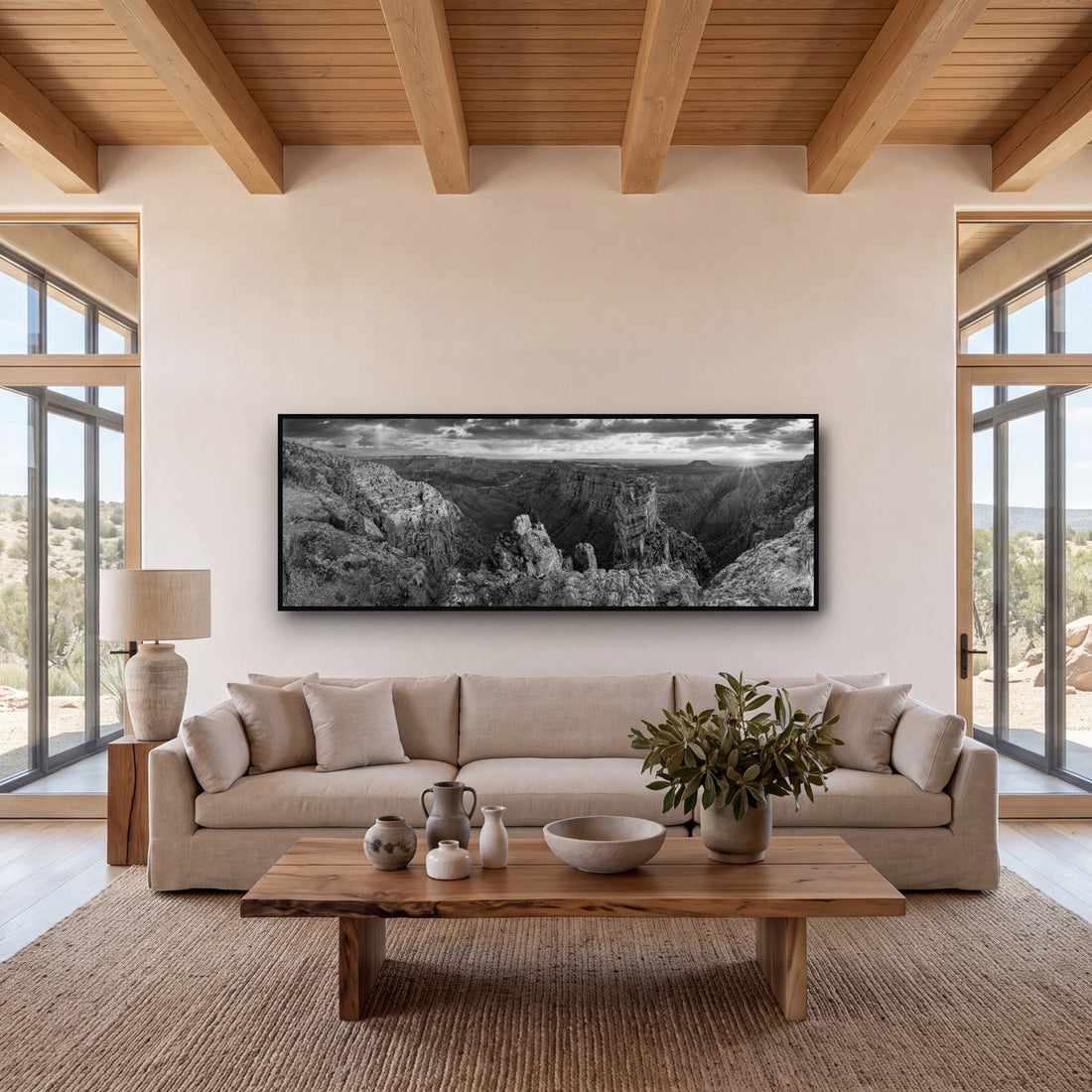 Large black and white fine art print of the Grand Canyon by Stephen Milner, shown in a styled interior
