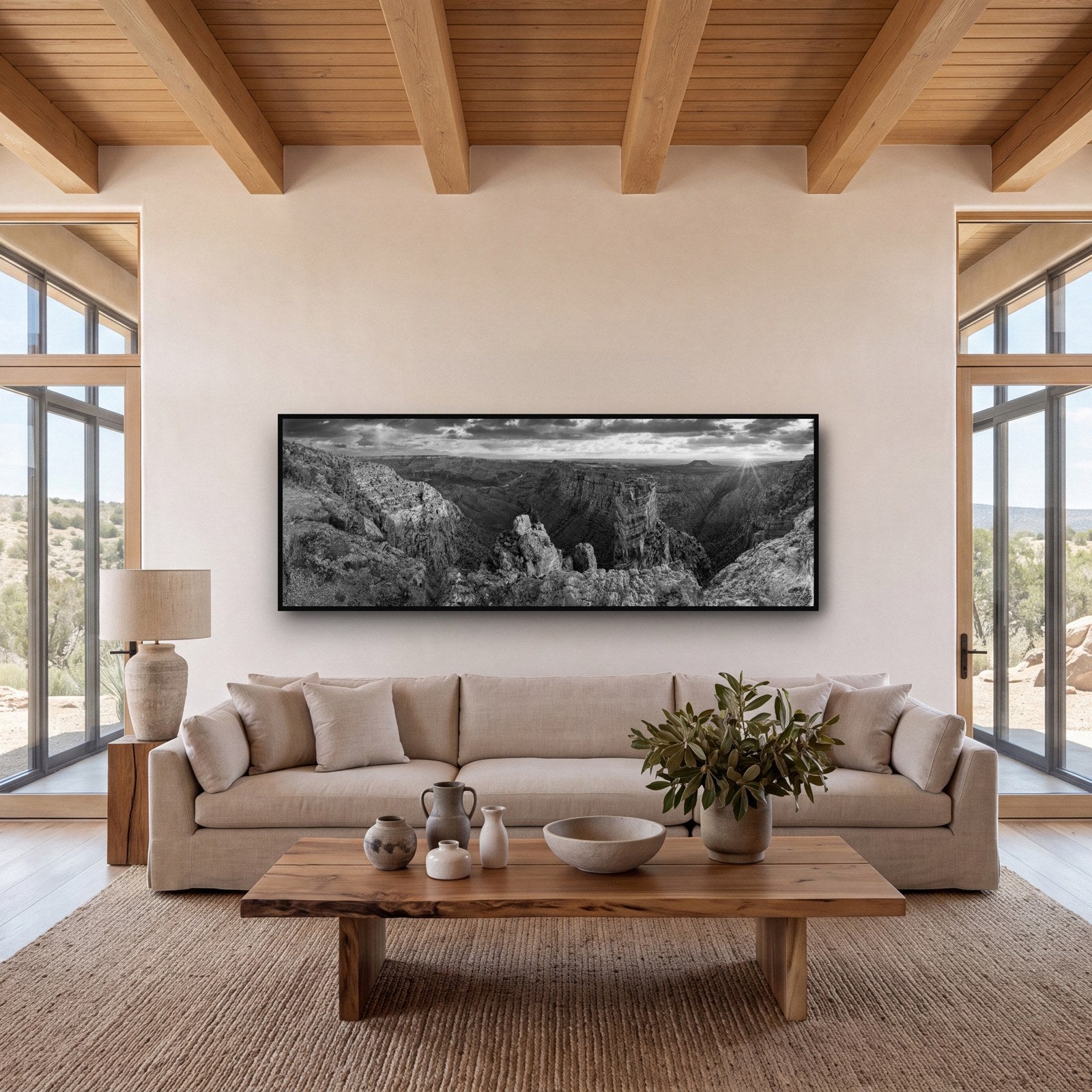 Large black and white fine art print of the Grand Canyon by Stephen Milner, shown in a styled interior