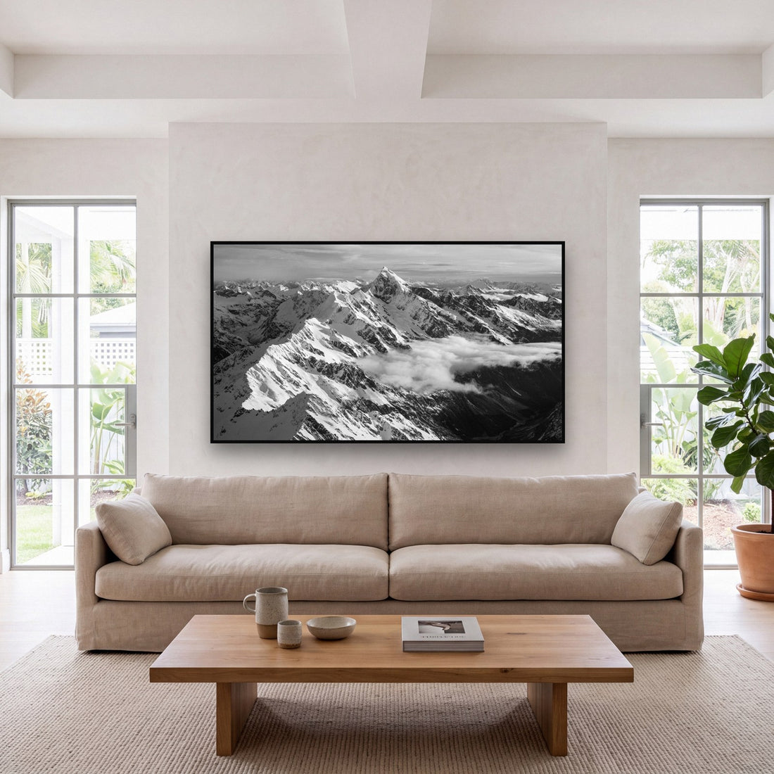 Large black and white fine art print of Mount Sefton in the Southern Alps by Stephen Milner, shown in a styled interior