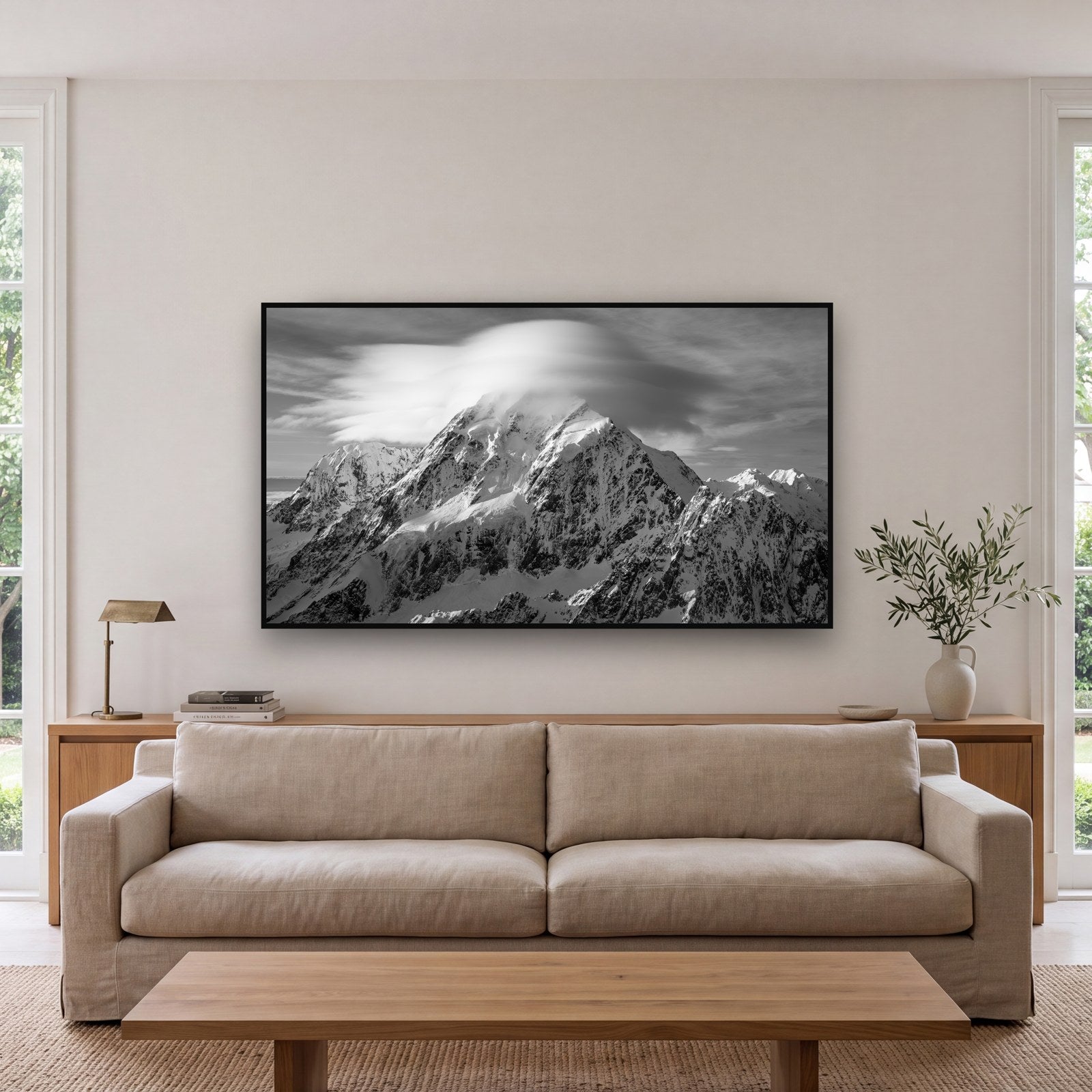 Large black and white fine art print of Aoraki Mount Cook by Stephen Milner, shown in a styled interior