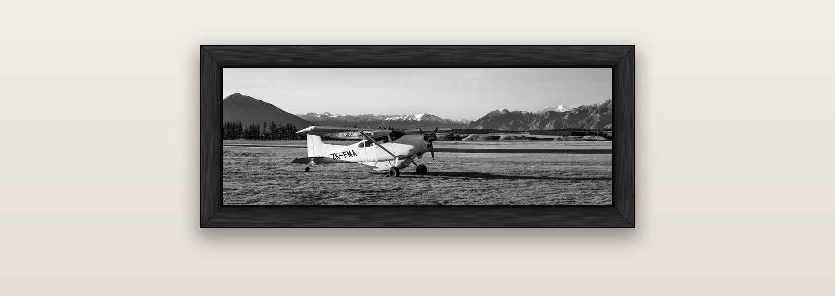Adventure's Prelude, Sunset at Mount Aspiring — black float frame canvas, 71 × 25 cm. New Zealand fine art landscape wall art by Stephen Milner.