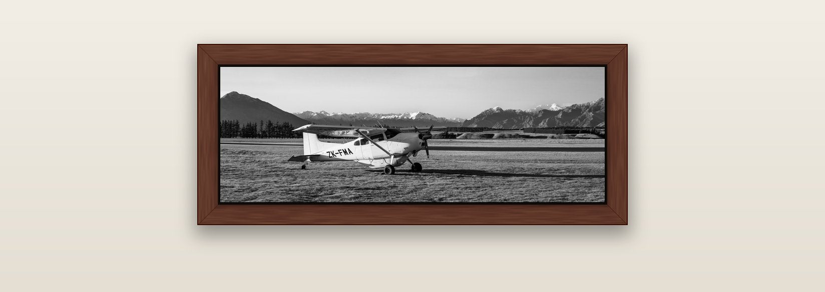 Adventure's Prelude, Sunset at Mount Aspiring — brown float frame canvas, 71 × 25 cm. New Zealand fine art landscape wall art by Stephen Milner.
