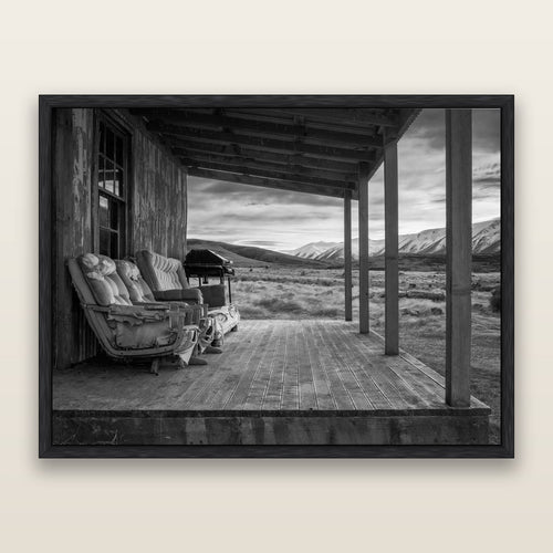Alpine Retreat, Rustic Comfort Amidst Splendour, black and white framed metallic canvas print, Black frame. New Zealand fine art wall art by Stephen Milner.