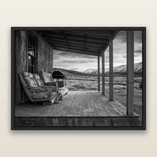 Alpine Retreat, Rustic Comfort Amidst Splendour, black and white framed metallic canvas print, Black frame. New Zealand fine art wall art by Stephen Milner.