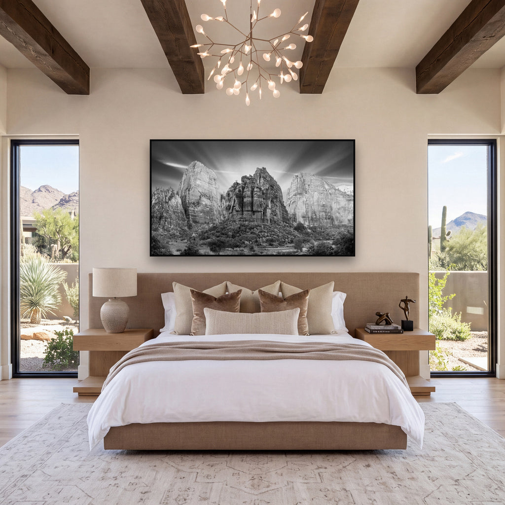 Angelic Sunrise Over Angels Landing, Zion's Majestic Embrace shown as large black and white wall art in a styled interior. Fine art landscape photography by Stephen Milner.
