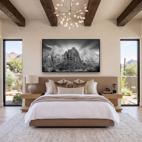 Angelic Sunrise Over Angels Landing, Zion's Majestic Embrace shown as large black and white wall art in a styled interior. Fine art landscape photography by Stephen Milner.