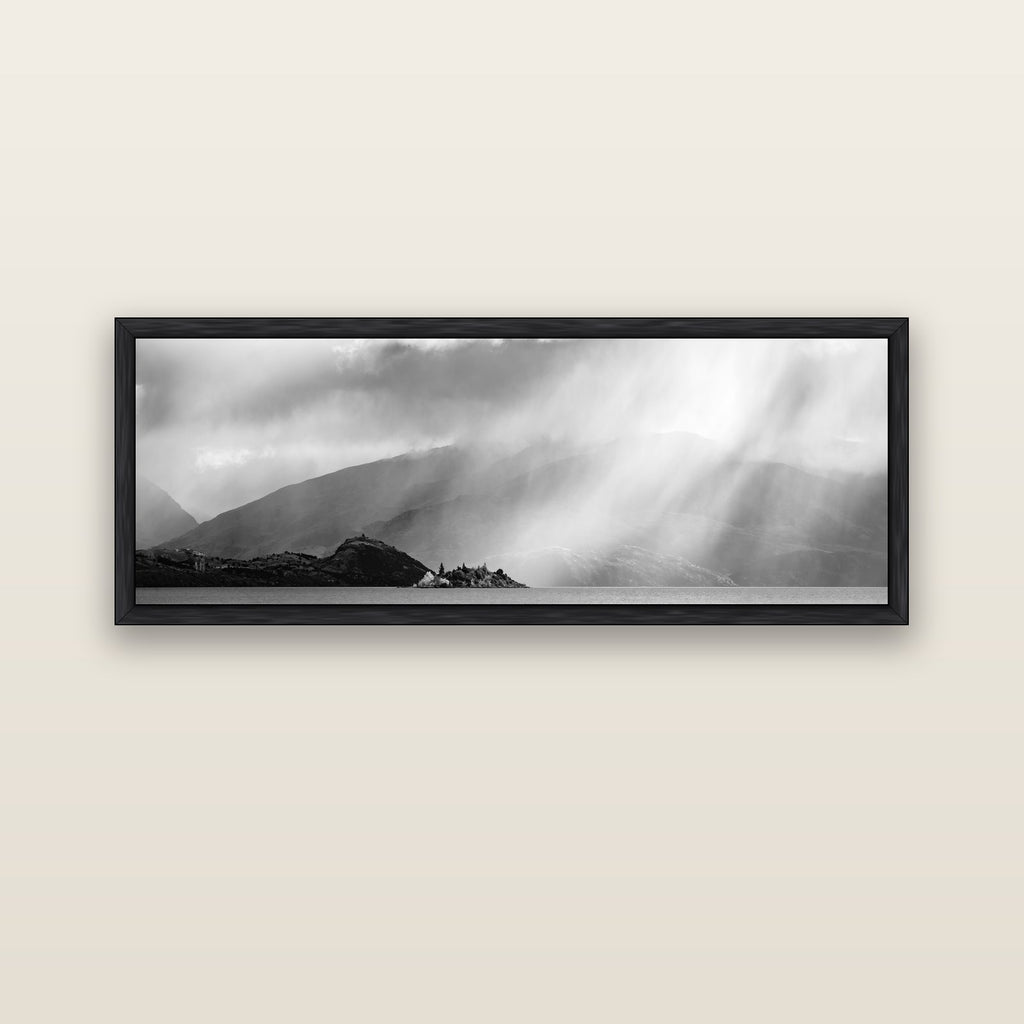 Aspiring Storm, Lake Wanaka — black float frame canvas, 152 × 56 cm. New Zealand fine art landscape wall art by Stephen Milner.