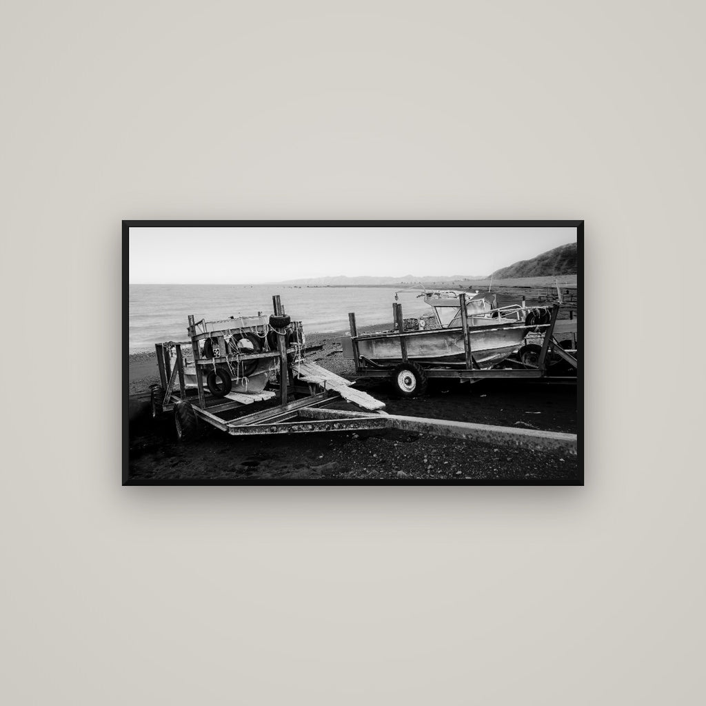Boats in the Bay, Cape Palliser — Basel Black Matte, 107×60 cm. New Zealand fine art wall art by Stephen Milner.
