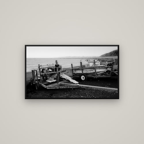 Boats in the Bay, Cape Palliser — Basel Black, 107×60 cm. New Zealand fine art wall art by Stephen Milner.
