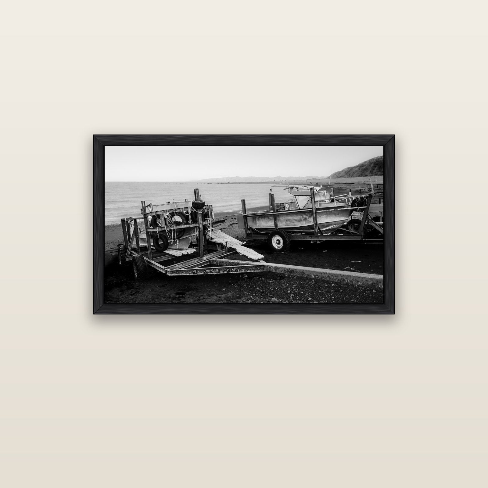 Boats in the Bay, Cape Palliser — black float frame canvas, 102 × 56 cm. New Zealand fine art landscape wall art by Stephen Milner.