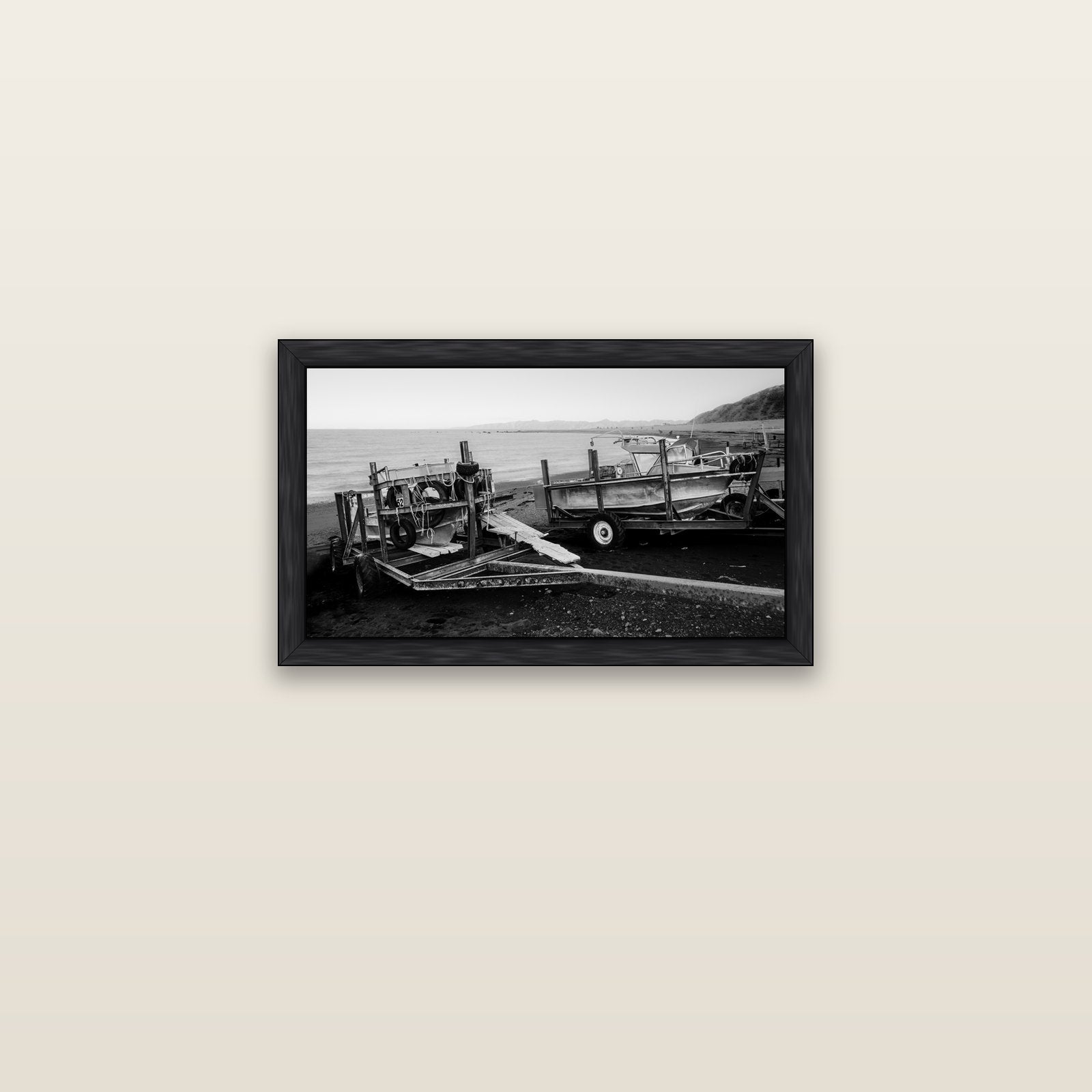 Boats in the Bay, Cape Palliser — black float frame canvas, 61 × 36 cm. New Zealand fine art landscape wall art by Stephen Milner.