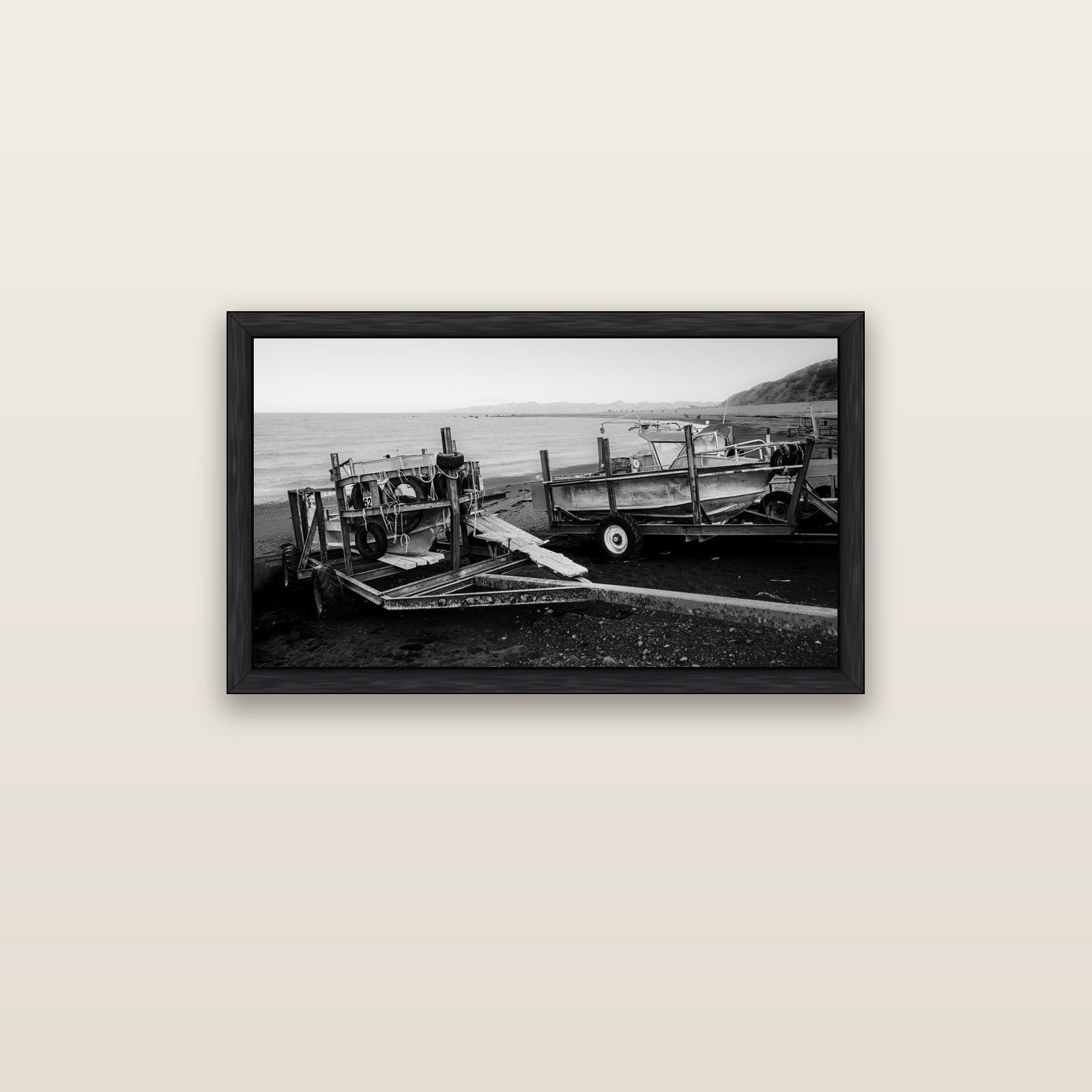 Boats in the Bay, Cape Palliser — black float frame canvas, 91 × 51 cm. New Zealand fine art landscape wall art by Stephen Milner.