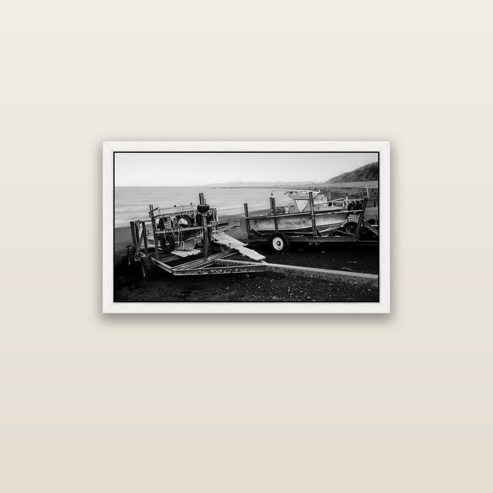 Boats in the Bay, Cape Palliser — white float frame canvas, 91 × 51 cm. New Zealand fine art landscape wall art by Stephen Milner.