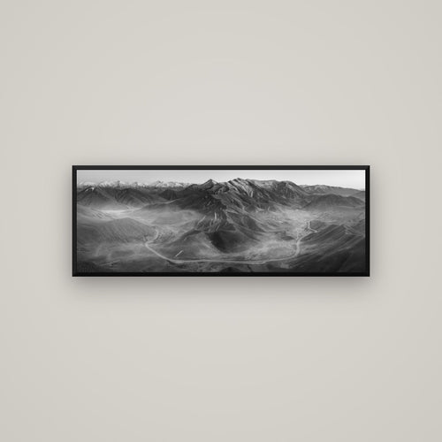 Dawn's Embrace, Lindis Pass Chronicles — Basel Black, 113×40 cm. New Zealand fine art wall art by Stephen Milner.