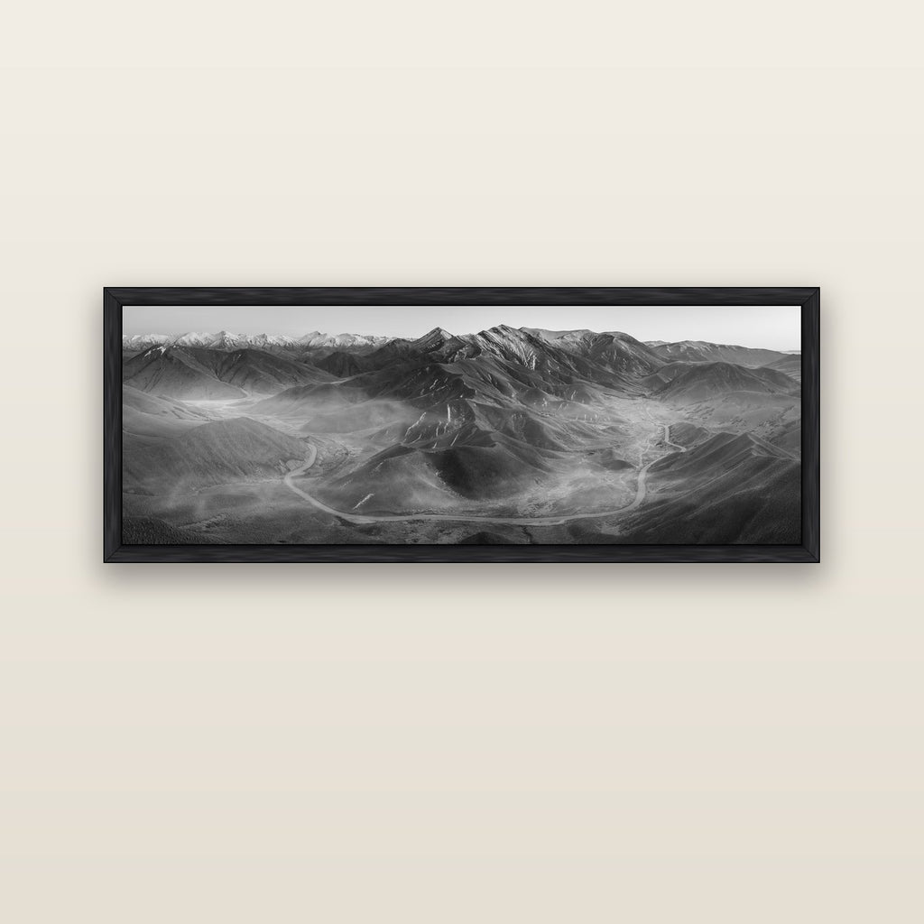 Dawn's Embrace, Lindis Pass Chronicles — black float frame canvas, 152 × 56 cm. New Zealand fine art landscape wall art by Stephen Milner.