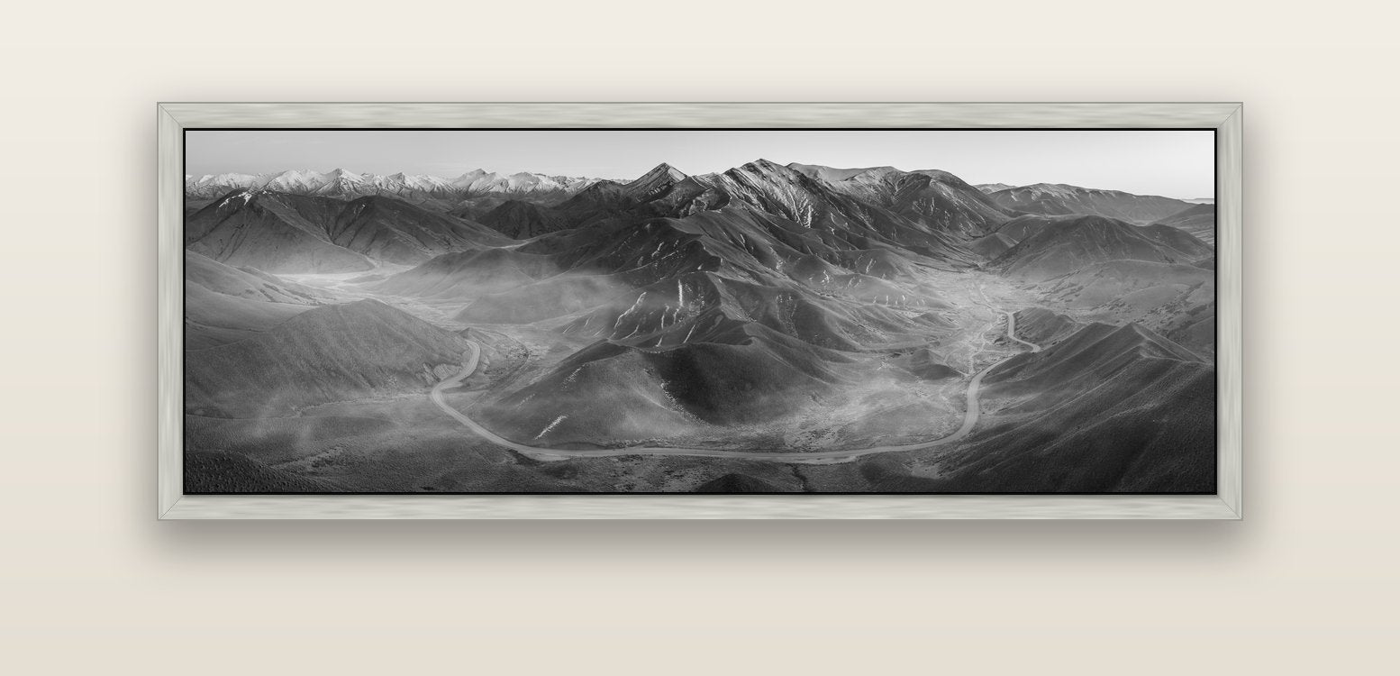 Dawn's Embrace, Lindis Pass Chronicles — silver float frame canvas, 152 × 56 cm. New Zealand fine art landscape wall art by Stephen Milner.