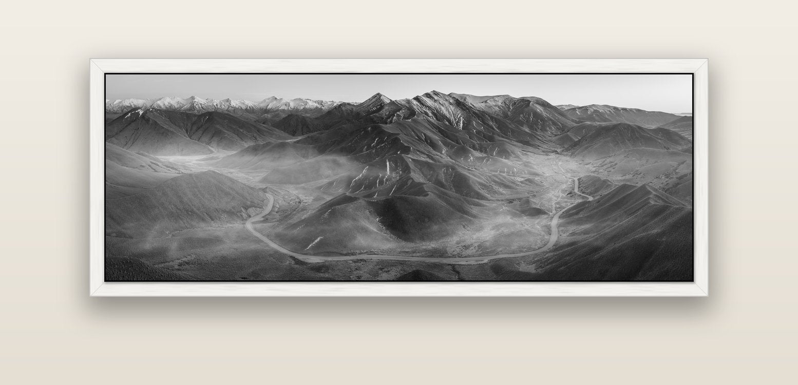 Dawn's Embrace, Lindis Pass Chronicles — white float frame canvas, 152 × 56 cm. New Zealand fine art landscape wall art by Stephen Milner.