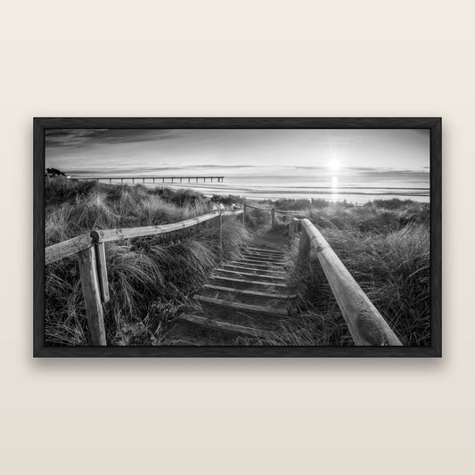 Dawn's Invitation, New Brighton Beach, black and white framed metallic canvas print, Black frame. New Zealand fine art wall art by Stephen Milner.
