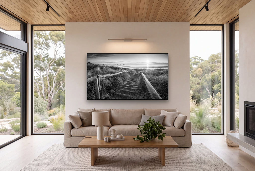 Dawn's Invitation, New Brighton Beach shown as large black and white wall art in a styled room, fine art by Stephen Milner.
