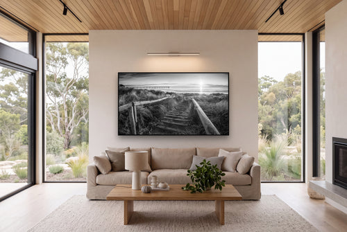 Dawn's Invitation, New Brighton Beach shown as large black and white wall art in a styled room, fine art by Stephen Milner.