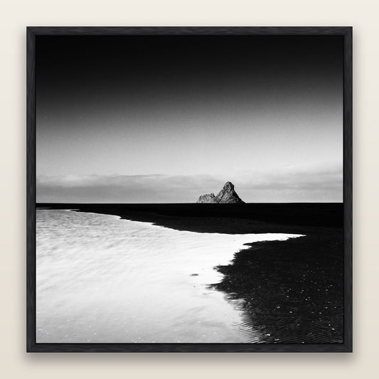 Dawns Lost Treasure, Karekare Beach, black and white framed metallic canvas print, Black frame. New Zealand fine art wall art by Stephen Milner.