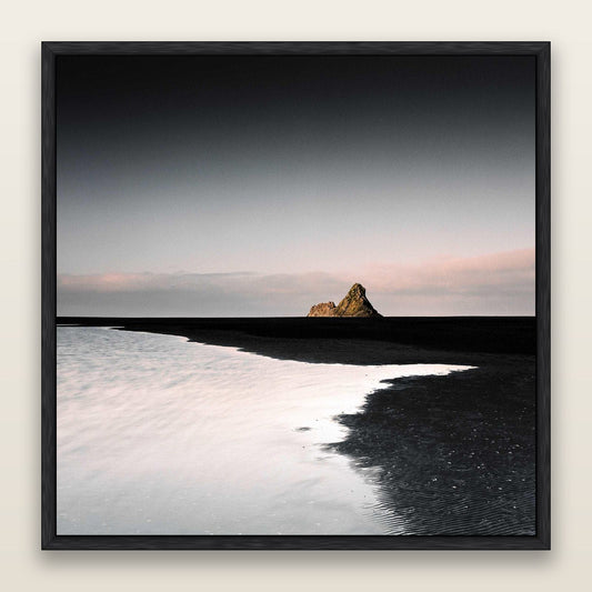 Dawns Lost Treasure, Karekare Beach — framed metallic canvas print, Black frame. New Zealand fine art landscape wall art by Stephen Milner.
