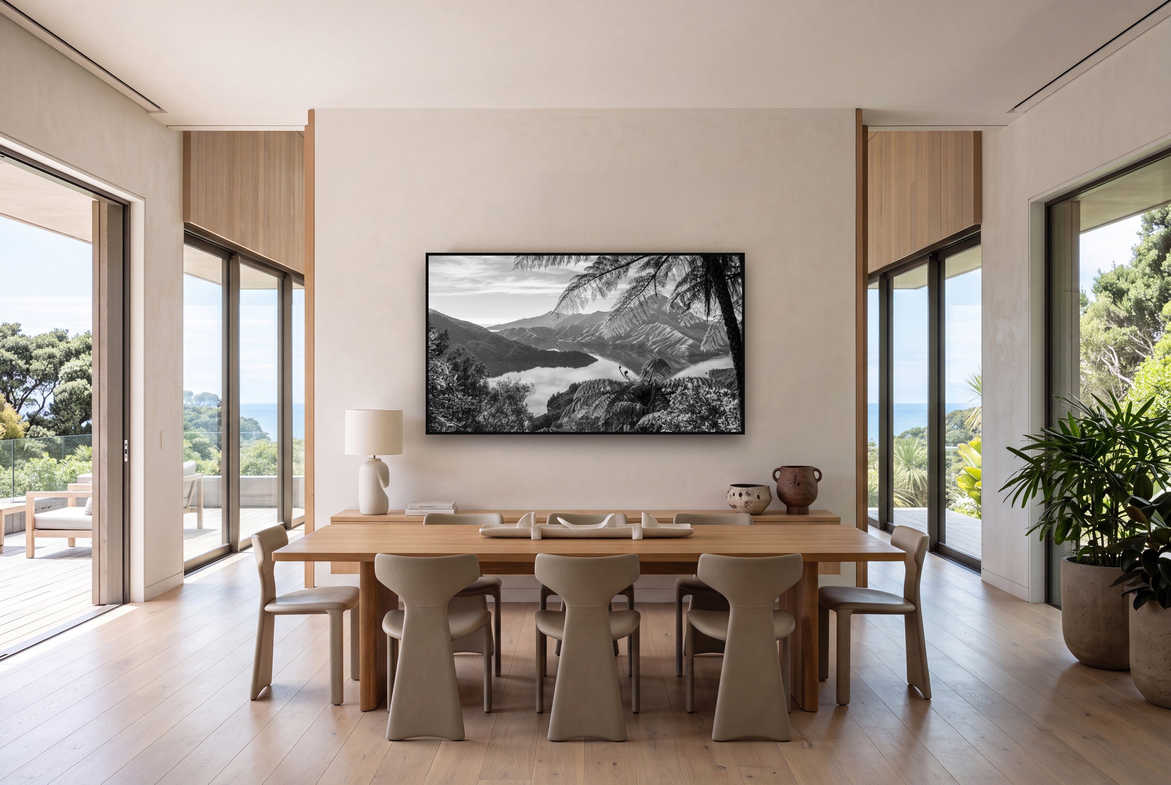 Nature's Window to Devils Staircase, Marlborough Sounds shown as large black and white wall art in a styled room, fine art by Stephen Milner.