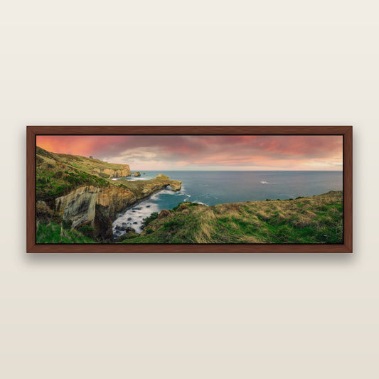 Dunedin Serenity, Tunnel Beach Sunset — framed metallic canvas print, Brown frame. New Zealand fine art landscape wall art by Stephen Milner.
