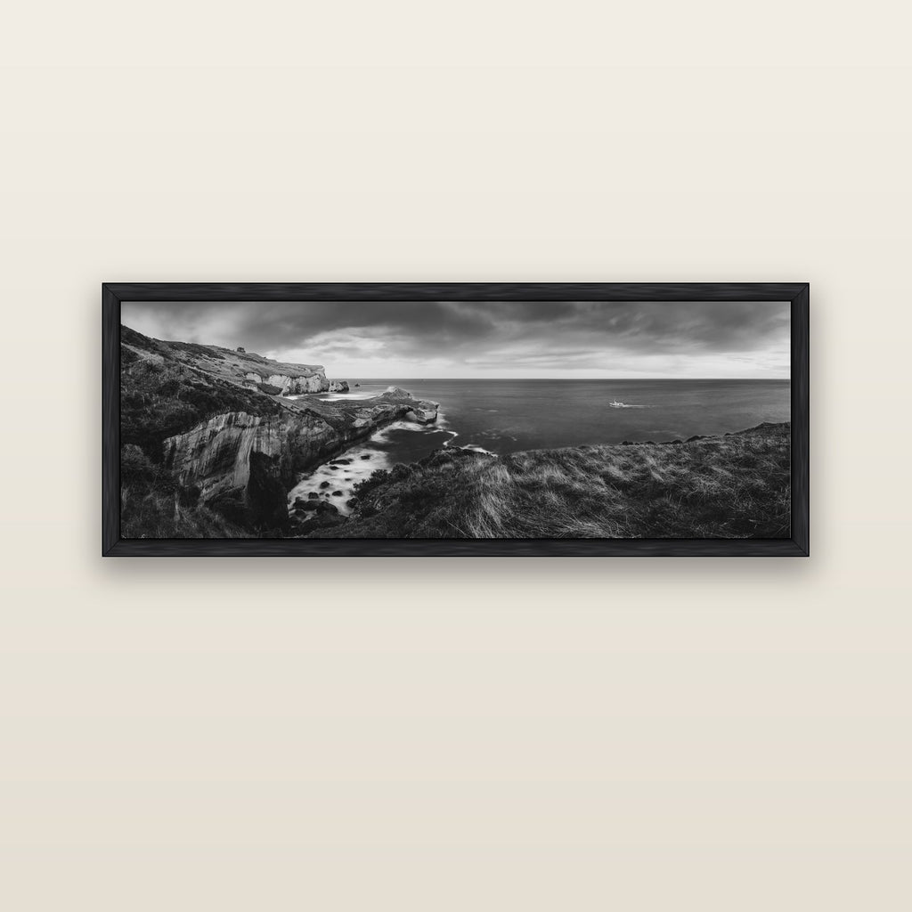 Dunedin Serenity, Tunnel Beach Sunset — black float frame canvas, 152 × 56 cm. New Zealand fine art landscape wall art by Stephen Milner.