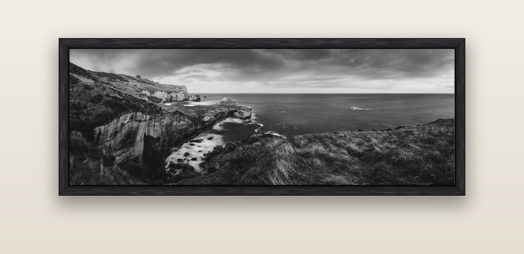 Dunedin Serenity, Tunnel Beach Sunset — black float frame canvas, 152 × 56 cm. New Zealand fine art landscape wall art by Stephen Milner.