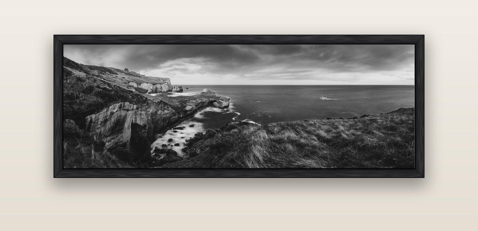 Dunedin Serenity, Tunnel Beach Sunset — black float frame canvas, 152 × 56 cm. New Zealand fine art landscape wall art by Stephen Milner.