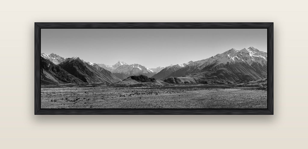 Edoras Unveiled, The Majesty of Mount Sunday — black float frame canvas, 152 × 56 cm. New Zealand fine art landscape wall art by Stephen Milner.