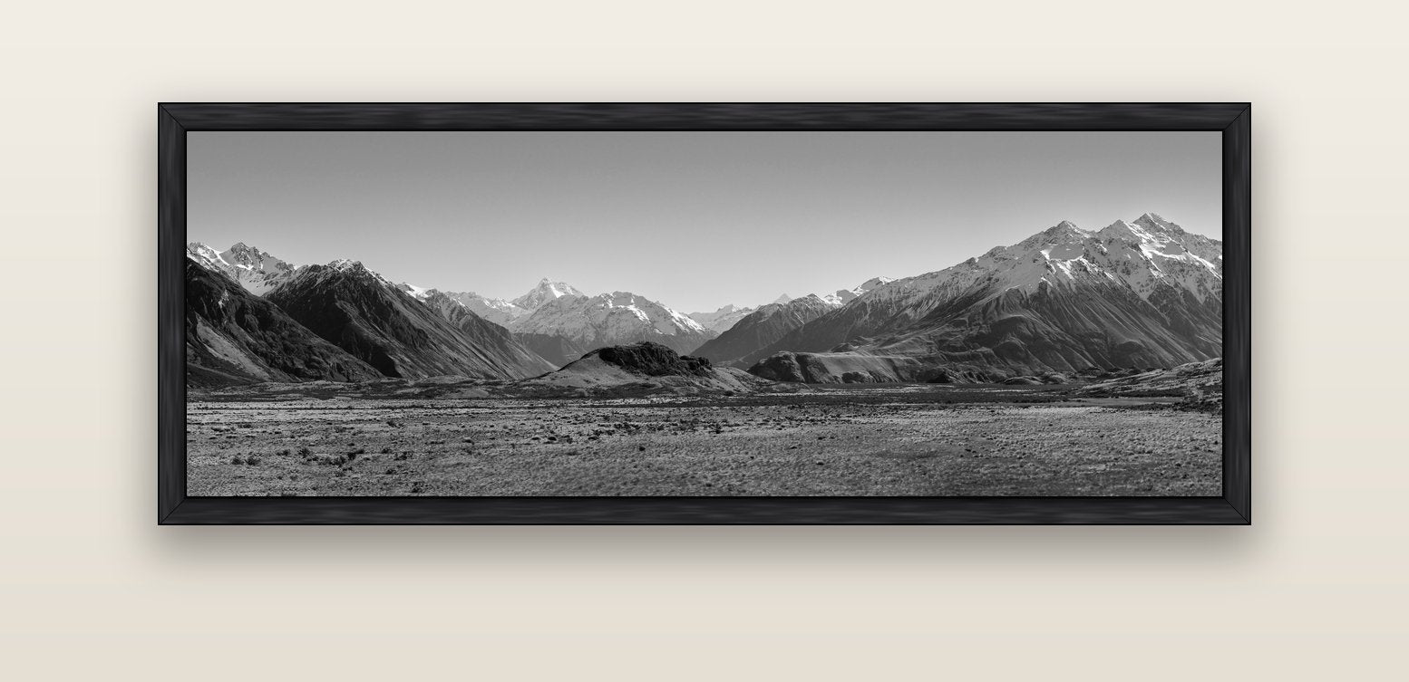 Edoras Unveiled, The Majesty of Mount Sunday — black float frame canvas, 152 × 56 cm. New Zealand fine art landscape wall art by Stephen Milner.