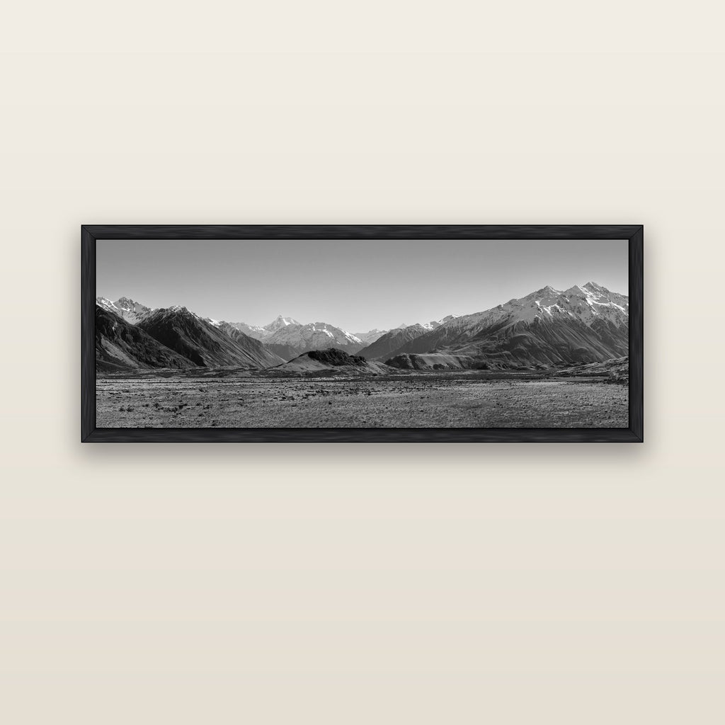 Edoras Unveiled, The Majesty of Mount Sunday — black float frame canvas, 152 × 56 cm. New Zealand fine art landscape wall art by Stephen Milner.