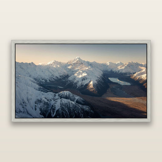 Elysian Heights, Mount Cook's Sunset Embrace — framed metallic canvas print, Antique Silver frame. New Zealand fine art landscape wall art by Stephen Milner.