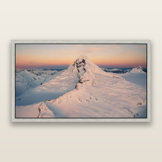 Elysian Majesty, Mount Aspiring's Evening Embrace — framed metallic canvas print, Antique Silver frame. New Zealand fine art landscape wall art by Stephen Milner.