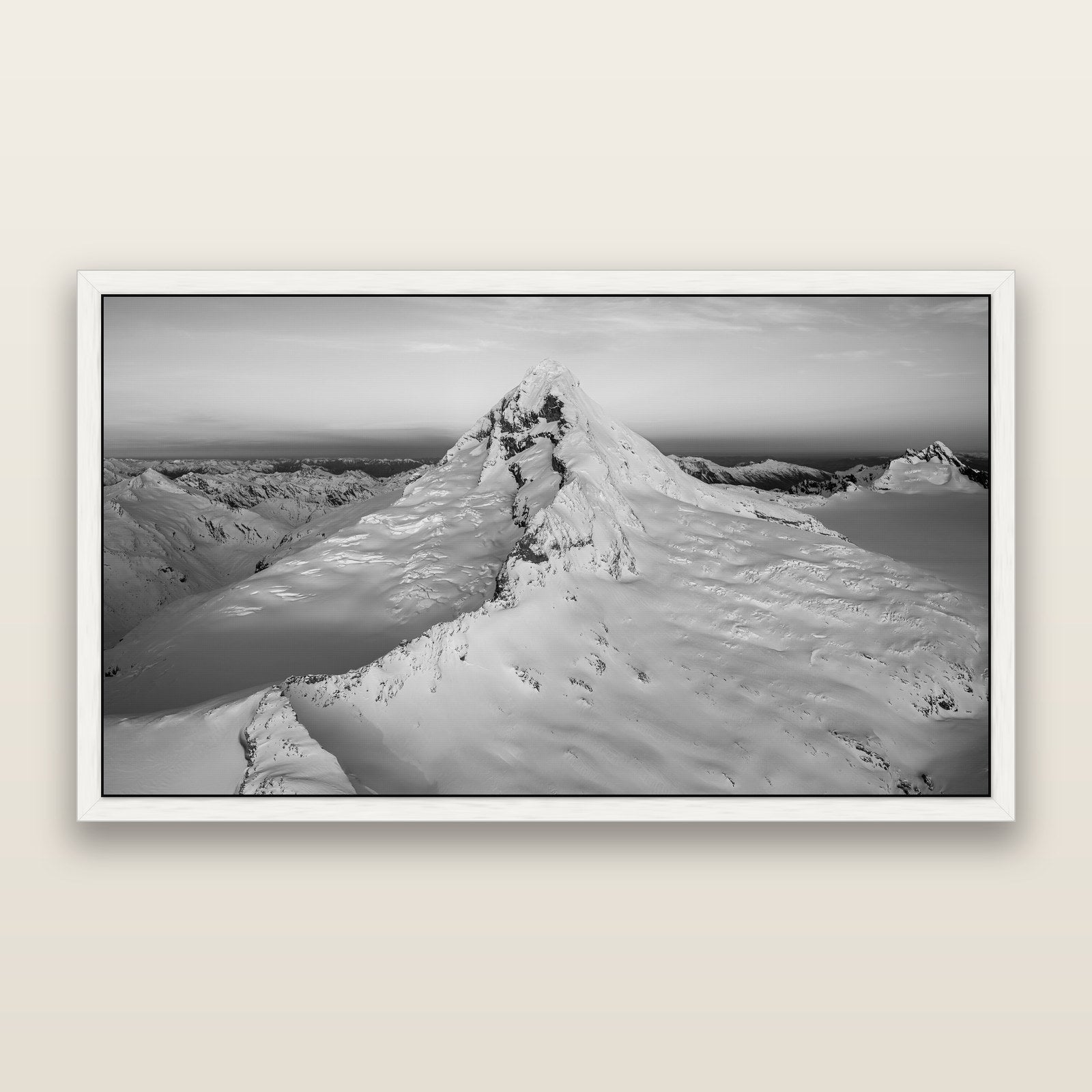 Elysian Majesty, Mount Aspiring's Evening Embrace, black and white framed metallic canvas print, White frame. New Zealand fine art wall art by Stephen Milner.