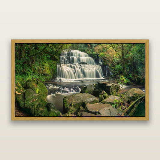 Elysian Serenity, Purakaunui Falls — framed metallic canvas print, Antique Gold frame. New Zealand fine art landscape wall art by Stephen Milner.