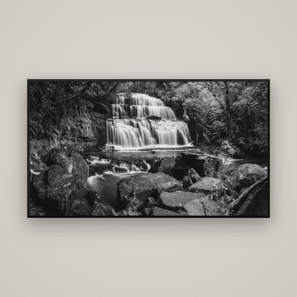 Elysian Serenity, Purakaunui Falls — Basel Black Matte, 160×90 cm. New Zealand fine art wall art by Stephen Milner.