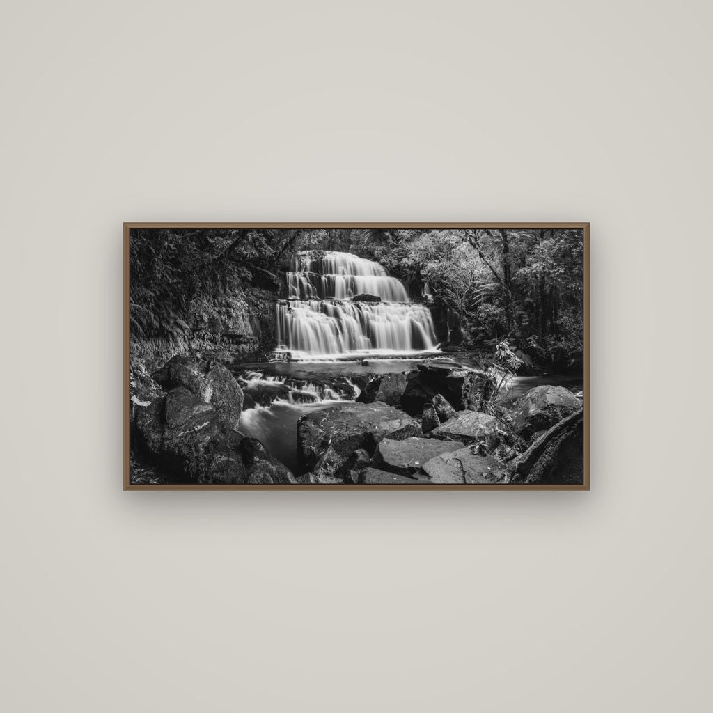 Elysian Serenity, Purakaunui Falls, Basel Walnut, 107×60 cm. New Zealand fine art photograph under matte acrylic glass.