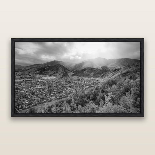 Light Over the Valley, Arrowtown, black and white framed metallic canvas print, Black frame. New Zealand fine art wall art by Stephen Milner.