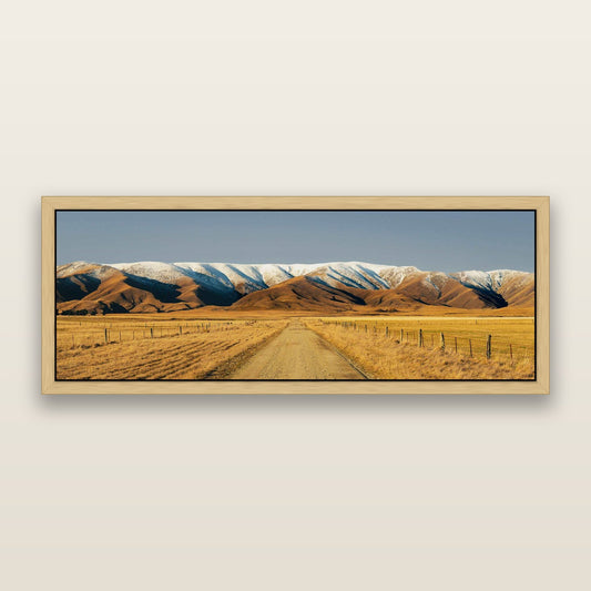 Golden Pathways, The Road to Hawkdun Heights — framed metallic canvas print, Natural frame. New Zealand fine art landscape wall art by Stephen Milner.