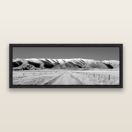 The Road to Hawkdun Heights, black and white framed metallic canvas print, Black frame. New Zealand fine art wall art by Stephen Milner.