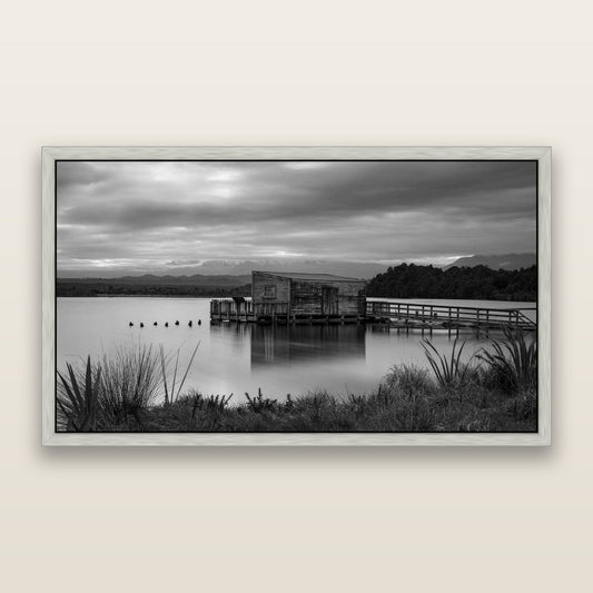 Guardian of the Lagoon, Ōkārito's Tranquil Embrace — framed metallic canvas print, Antique Silver frame. New Zealand fine art landscape wall art by Stephen Milner.